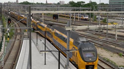 Double Decker Train arrives at the new Utrecht Central train station at the end of the day, Utrecht, The Netherlands, July 12th 2019