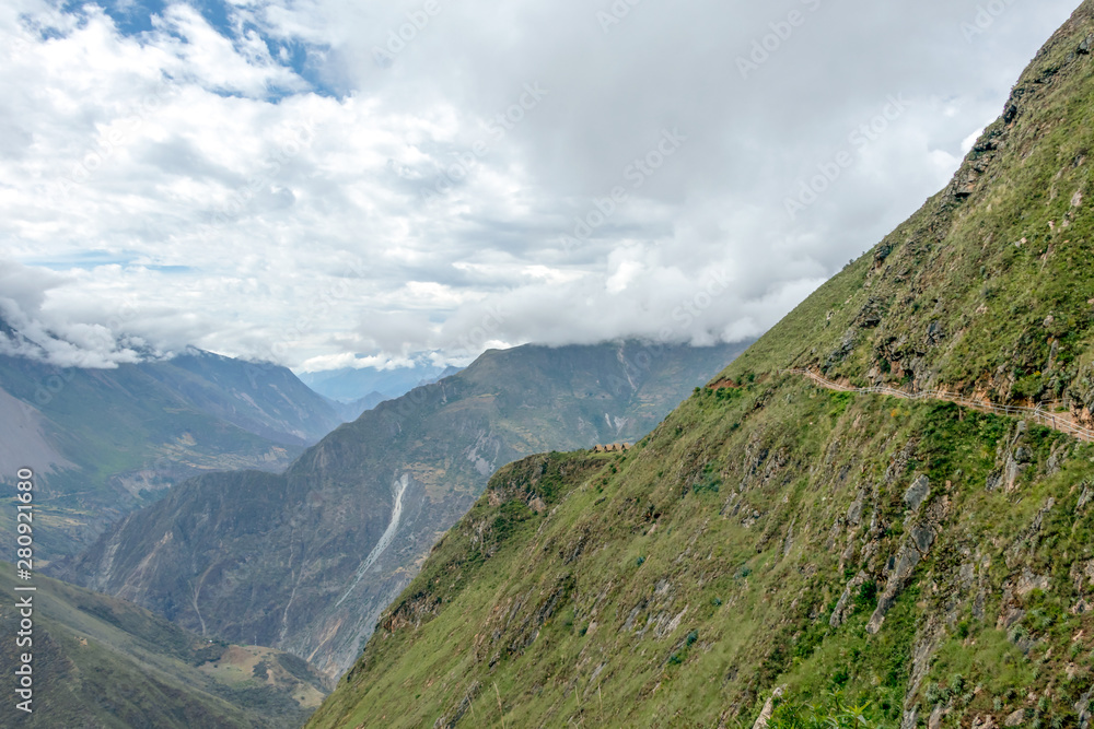 Hiking path at high altitude Peruvian mountains, the Choquequirao trek to Machu Picchu, alternative to Inca Trail, Peru