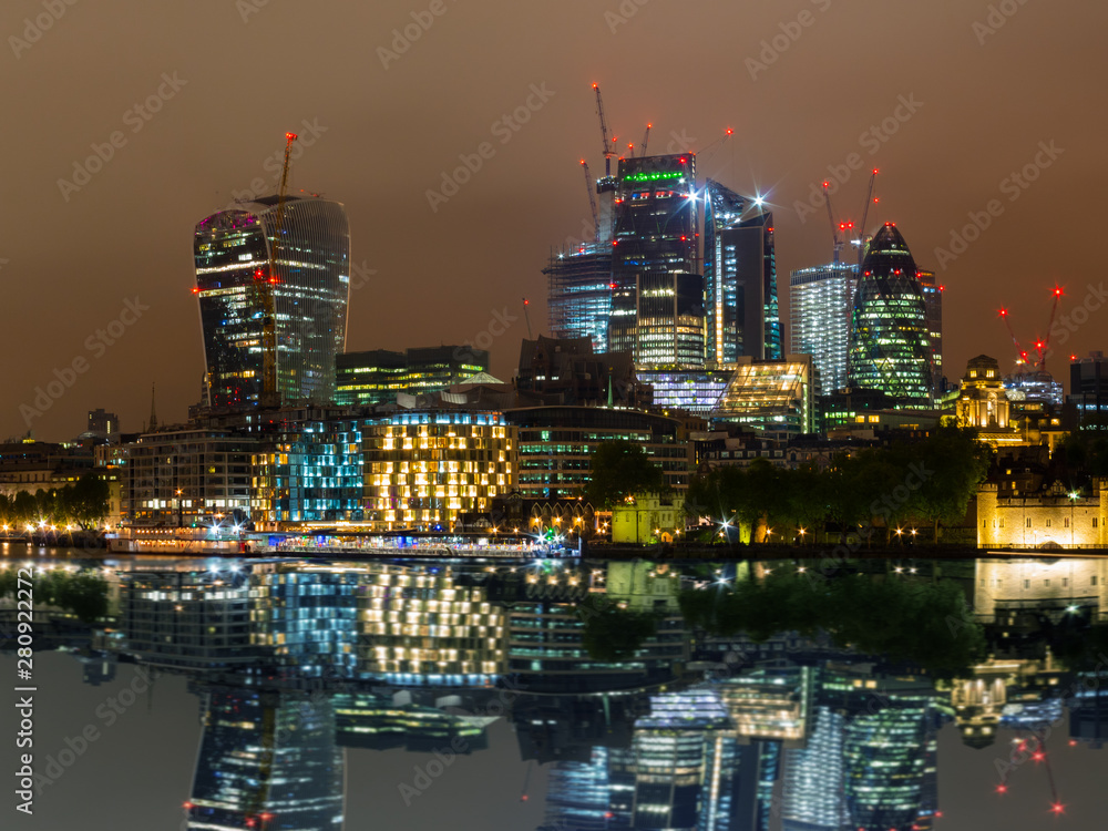 Fototapeta premium London skyline with its famous skyscrapers at night