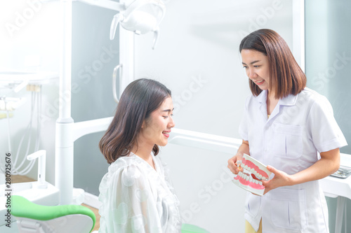Wallpaper Mural Portrait of a dentist being positive about oral health of patient Torontodigital.ca
