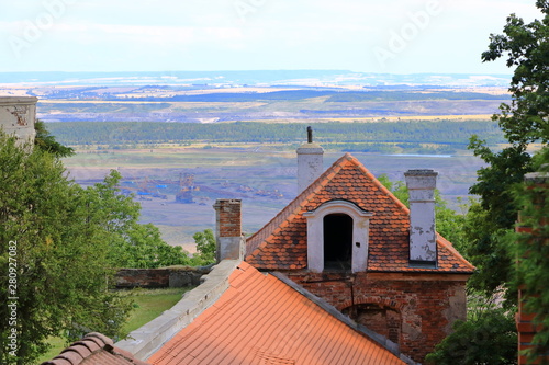 Jezeri Castle situated near coal mine in Northern Bohemia, Czech Republic. photo