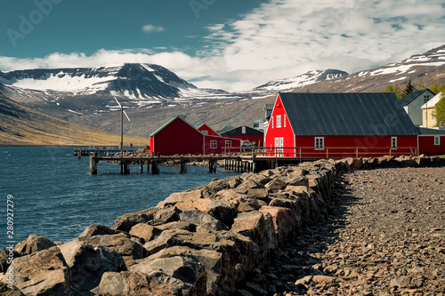  Old red classic Icelandic houses at the fish port of Eskifjordur. Easternfjords Iceland.