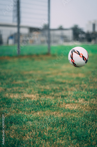 soccer ball on green field