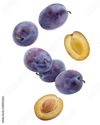 Fototapeta Falling plum isolated on white background, clipping path, full depth of field