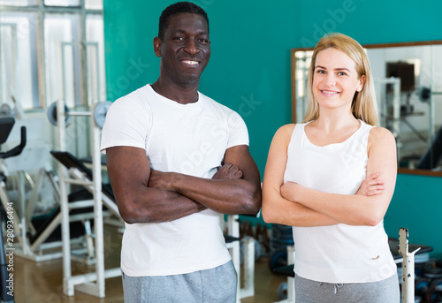 Couple posing at gym