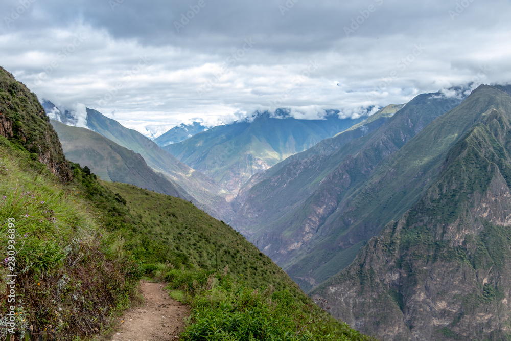Hiking path at high altitude Peruvian mountains between Choquequirao and Maizal, Peru
