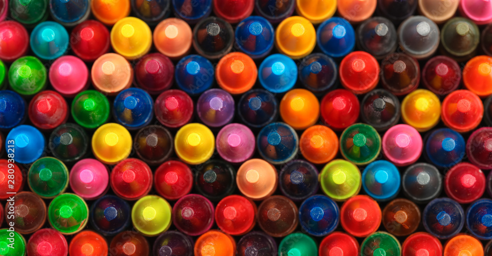 Collection of colorful crayons mixed together - obrazy, fototapety, plakaty 