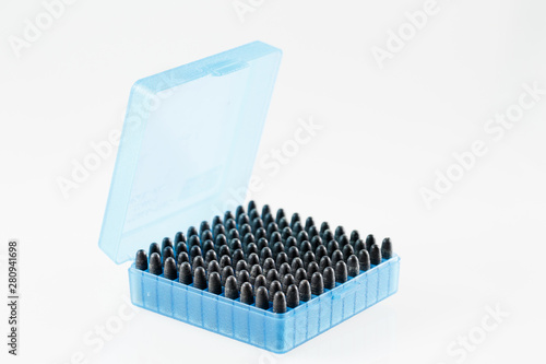 Hunting cartridges in a plastic box. Bullet storage box.