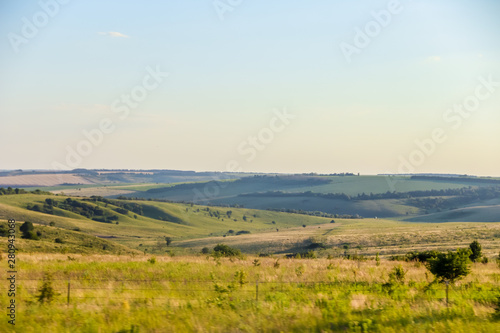 Russian open spaces. Field. Summer Russian landscapes. Road views. Summer landscape background
