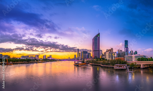 Beautiful sunset evening afternoon panorama overlooking South Bank Parklands  The Brisbane River  and Brisbane s City Skyline during winter