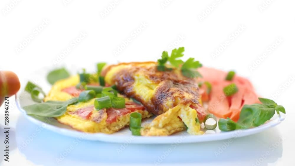 fried omelet from homemade organic eggs with tomatoes and green onions fried omelet from homemade organic eggs with tomatoes and green onions