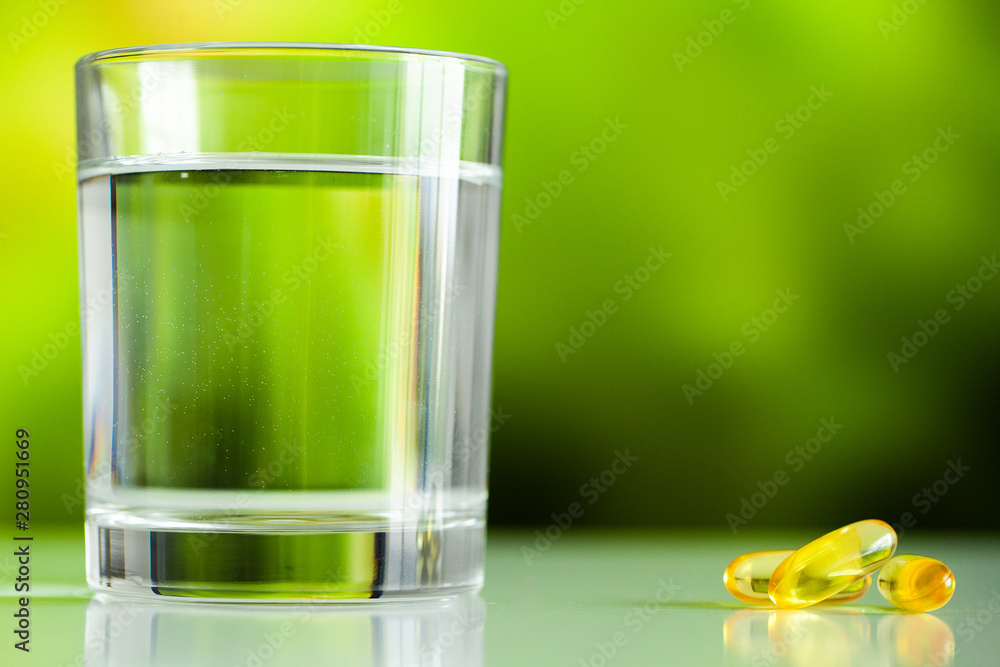 Vitamins supplements, fish oil in yellow capsules omega 3. Vitamins supplements, fish oil in yellow capsules omega 3.