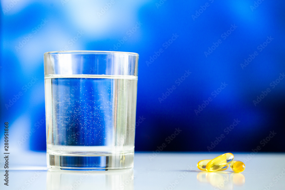 Vitamins supplements, fish oil in yellow capsules omega 3. Vitamins supplements, fish oil in yellow capsules omega 3.