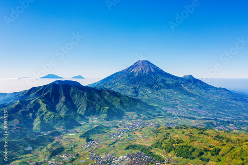 Dieng plateau with village and Sindoro mountain
