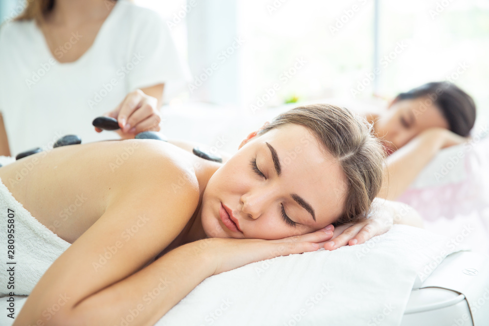 Leisure background, Beautiful girl is take a rest and smile relaxing by handle soft massage on back. Caucasian is feeling good and sleep posture in luxury spa, Concept Health and Beauty Background. Leisure background, Beautiful girl is take a rest and smile relaxing by handle soft massage on back. Caucasian is feeling good and sleep posture in luxury spa, Concept Health and Beauty Background.