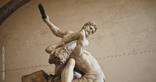 Low angle view of impressive sculpture of greek demigod Hercules and Nessus centaur. Roman statue in outdoor museum in Piazza della Signoria. Travel to Florence, Italy