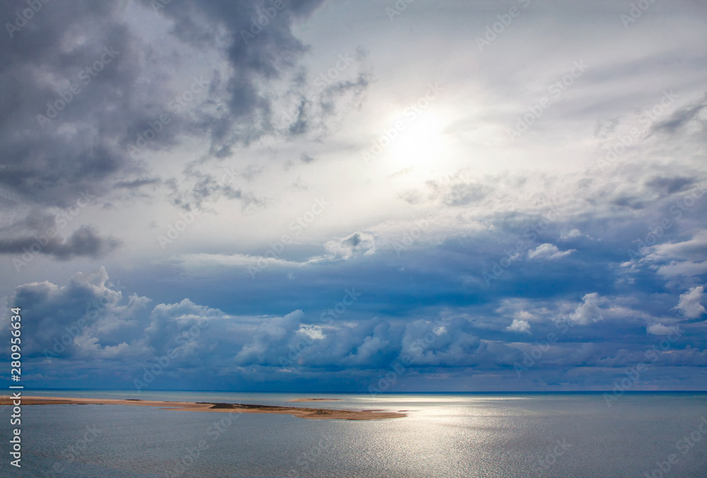 beauty world with sun and clouds over Atlantic Ocean