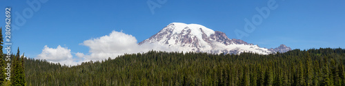 Beautiful Panoramic American Mountain Landscape view during a sunny summer day. Taken in Paradise, Mt Rainier National Park, Washington, United States of America.