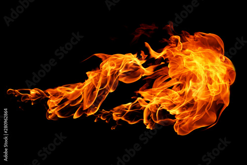 Fotografiet Fire flames isolated on black background, movement of fire flames