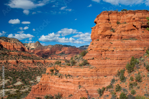 Magnificent red rock scenery around Sedona, Arizona on a late autumn afternoon under a beautiful cloudscape.