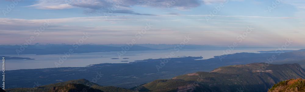 Beautiful Panoramic view of Canadian Mountain Landscape during a vibrant summer sunset. Taken at Mt Arrowsmith, near Nanaimo, Vancouver Island, BC, Canada.