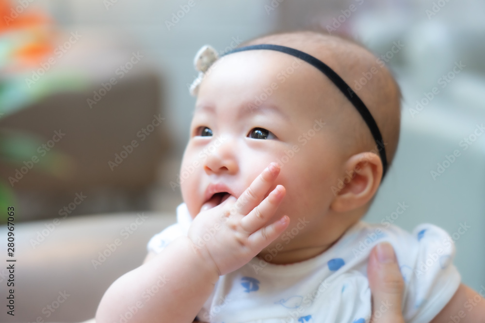 Asian baby happy in the graden.Asian baby girl happy family time. Asian baby happy in the graden.Asian baby girl happy family time.