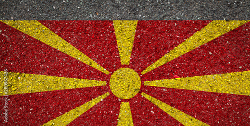 National flag of Macedonia on a stone background.The concept of national pride and symbol of the country.