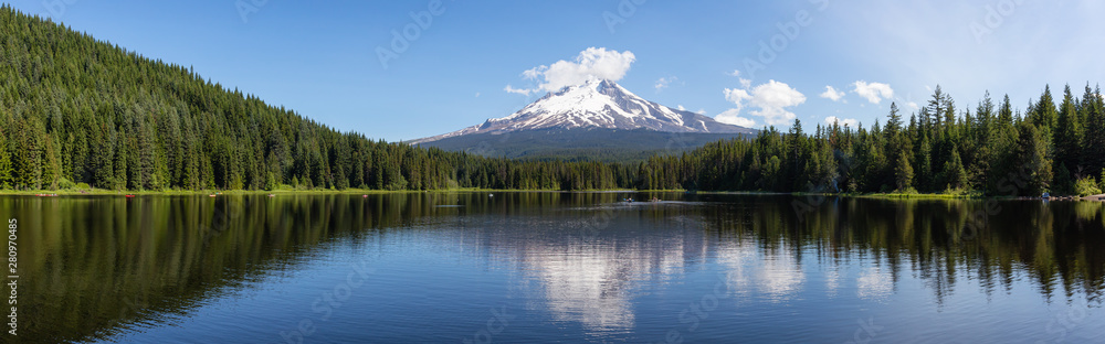 Beautiful Panoramic Landscape View of a Lake with Mt Hood in the background during a sunny summer day. Taken from Trillium Lake, Mt. Hood National Forest, Oregon, United States of America.