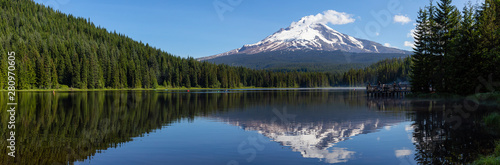 Beautiful Panoramic Landscape View of a Lake with Mt Hood in the background during a sunny summer day. Taken from Trillium Lake, Mt. Hood National Forest, Oregon, United States of America.