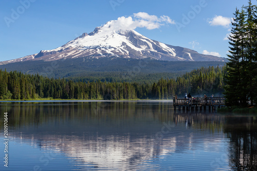 Beautiful Landscape View of a Lake with Mt Hood in the background during a sunny summer day. Taken from Trillium Lake, Mt. Hood National Forest, Oregon, United States of America.