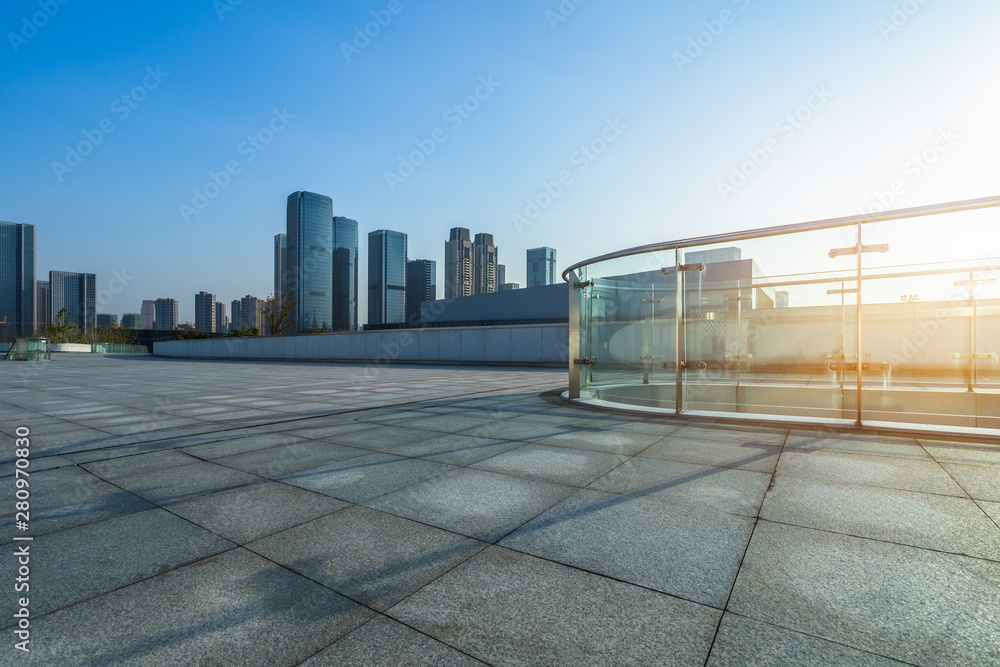 cityscape and skyline of hangzhou in blue sky from empty floor