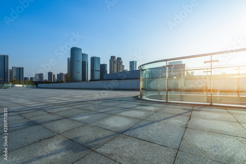 cityscape and skyline of hangzhou in blue sky from empty floor