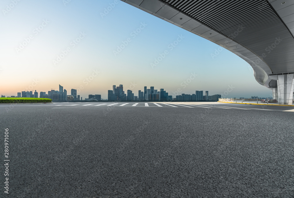 empty asphalt road with city skyline background in china.