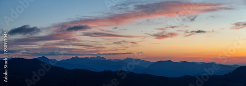 Fototapeta Naklejka Na Ścianę i Meble -  Beautiful Panoramic View of American Mountain Landscape during a vibrant and colorful summer sunset. Taken from Sun Top Lookout, in Mt Rainier National Park, South of Seattle, Washington, USA.