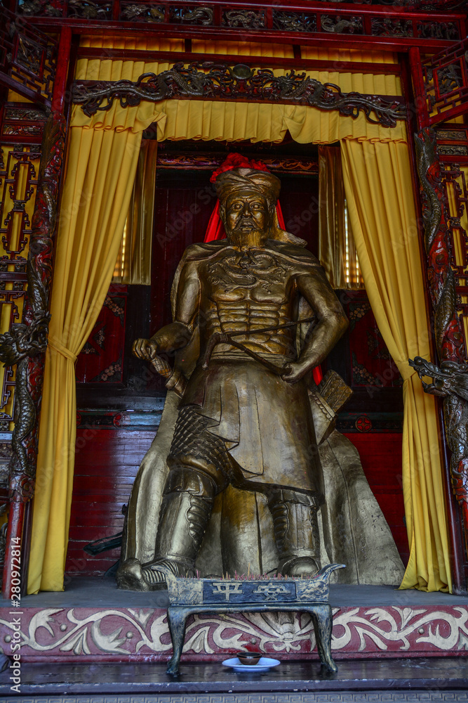 God statue at ancient temple in Nanning, China