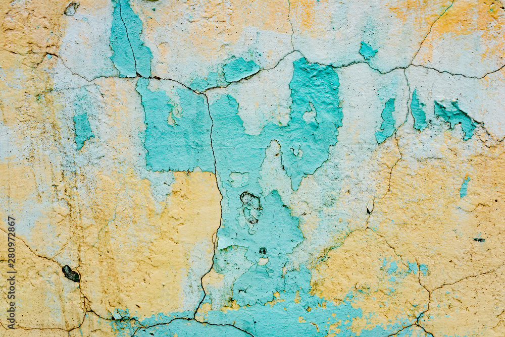 Obraz premium Texture of a concrete wall with cracks and scratches which can be used as a background