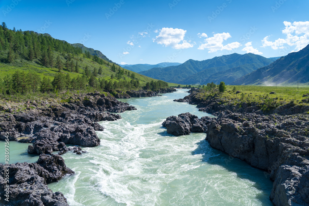 turquoise rapid mountains river flow through volcanic rocks, katun river, altai