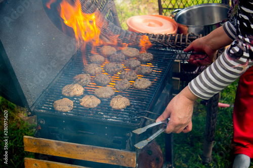 Meat and vegetables cooked on a barbecue