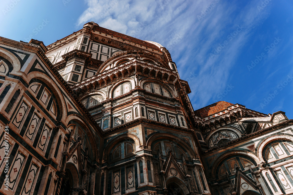The side facade of the Cattedrale di Santa Maria del Fiore | FLORENCE, ITALY - 14 SEPTEMBER 2018.