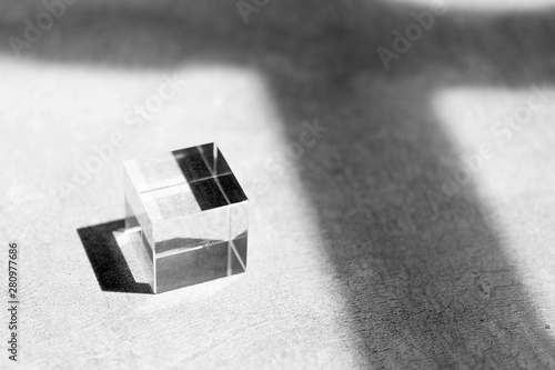 Fototapeta Naklejka Na Ścianę i Meble -  glass cube on a gorund with shadow in monochrome, minimal style