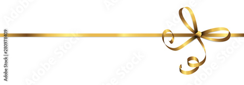 golden colored ribbon bow