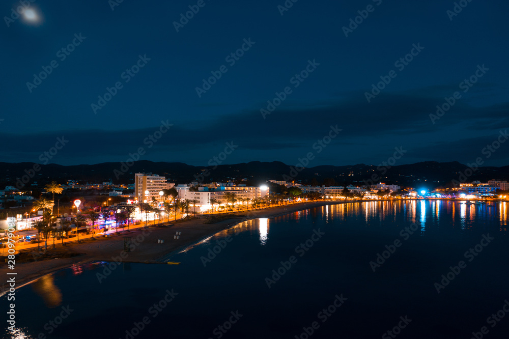 Beautiful aerial view on coast of the night city