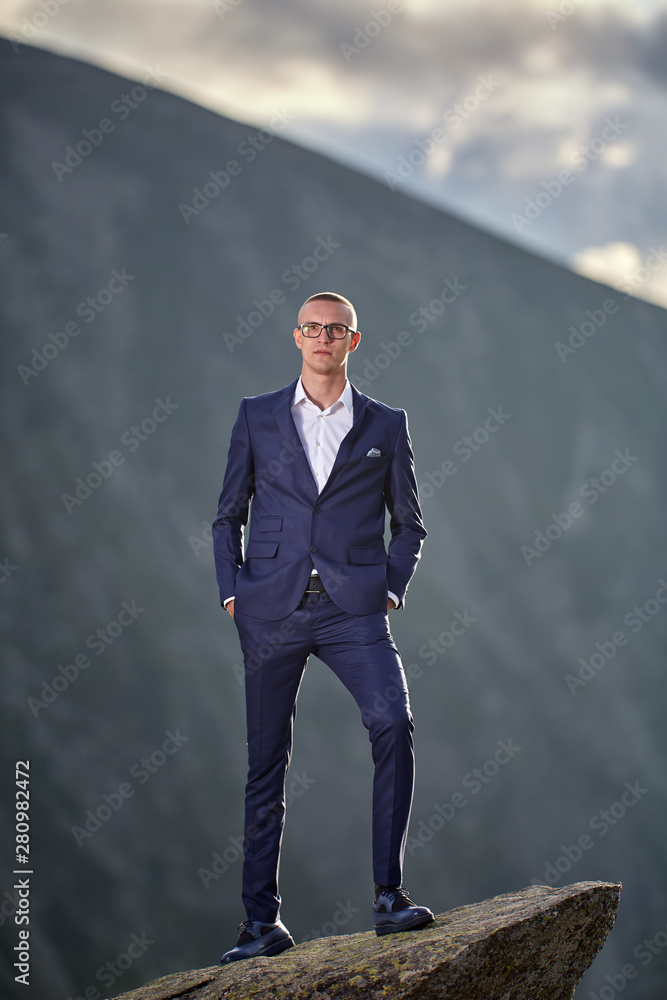 Businessman on the mountain Businessman on the mountain