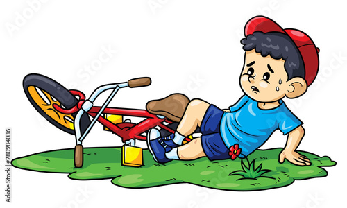 Boy falls off a bicycle