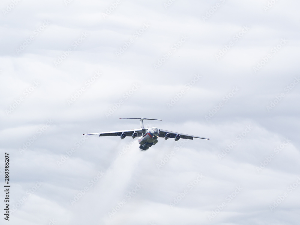 Fototapeta premium il-76, sky, firefighter, tanker, soviet union, russian, military transport, cargo transport, cargo plane, air, blue, pilot, fly, speed, jet, force, formation, wing, airshow, transportation, sport, aer