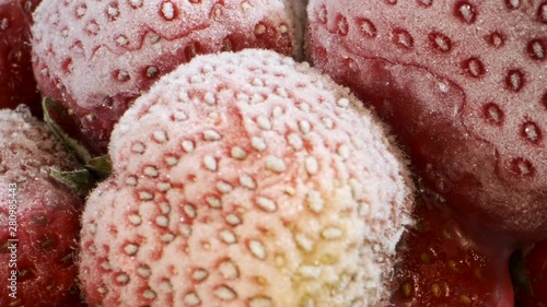 Extreme closeup of fresh frozen strawberries, Rotation 360 degrees, Close-up photo