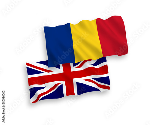 National vector fabric wave flags of Great Britain and Romania isolated on white background. 1 to 2 proportion.