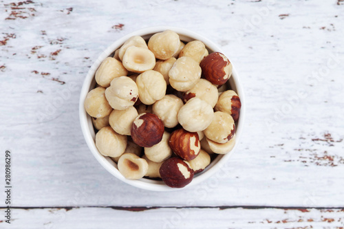 A bowl with shelled hazel nuts