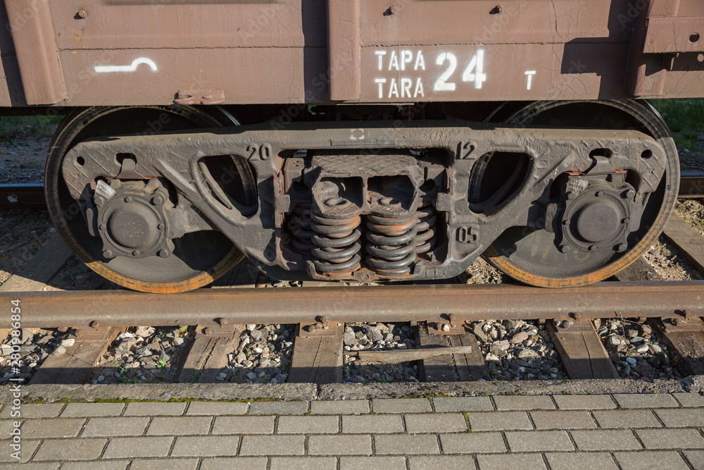 City Riga, Latvia Republic. A freight wagon is standing on a rail track. Juny 28. 2019 Travel photo. City Riga, Latvia Republic. A freight wagon is standing on a rail track. Juny 28. 2019 Travel photo.