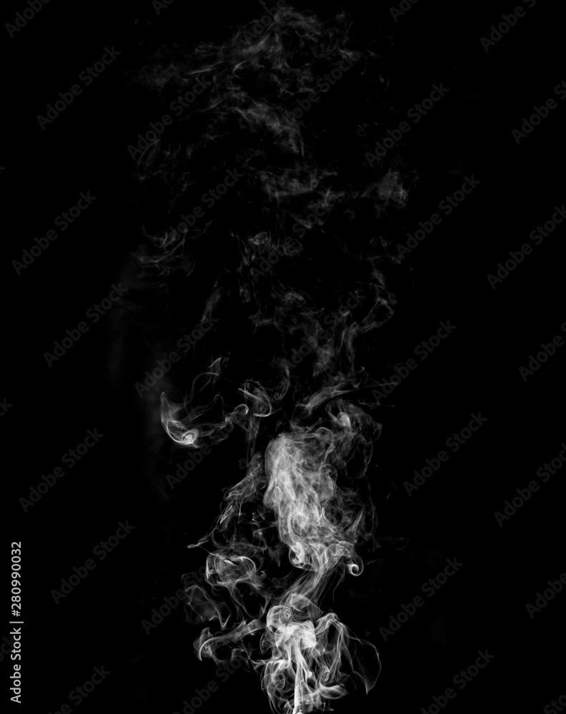 jet of gray smoke on a black background jet of gray smoke on a black background